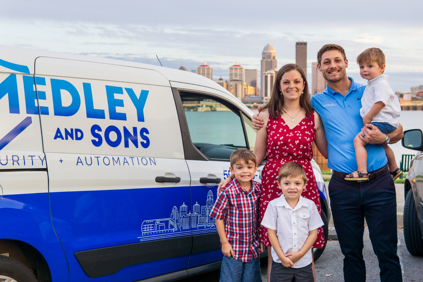Medley & Sons Family with Louisville KY Skyline behind